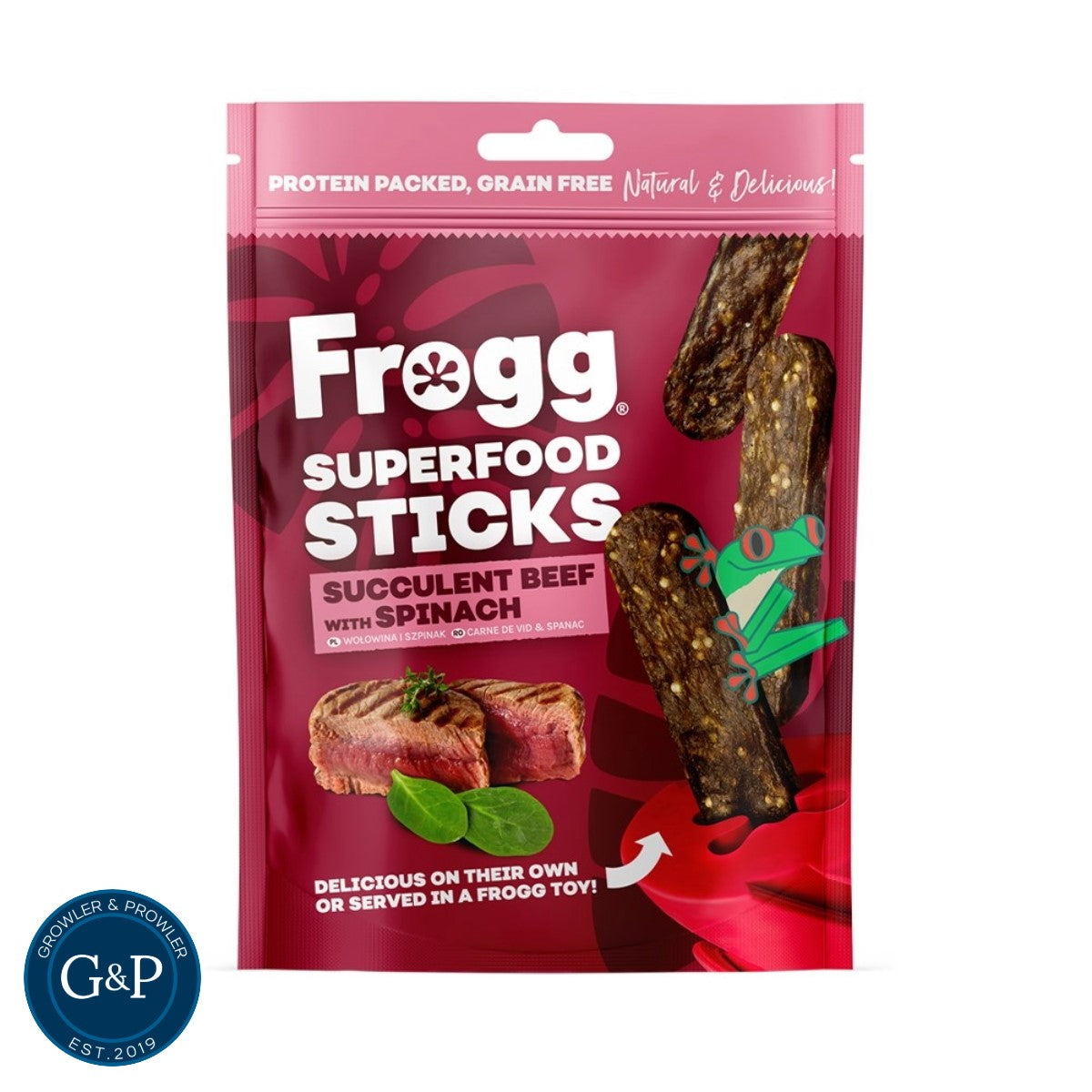 Frogg Beef Superfood Sticks, a high-protein, grain-free dog treat with succulent beef and spinach, available from Growler & Prowler, a Manchester-based company. The packaging shows dark brown sticks alongside images of beef and spinach, with a playful frog character.