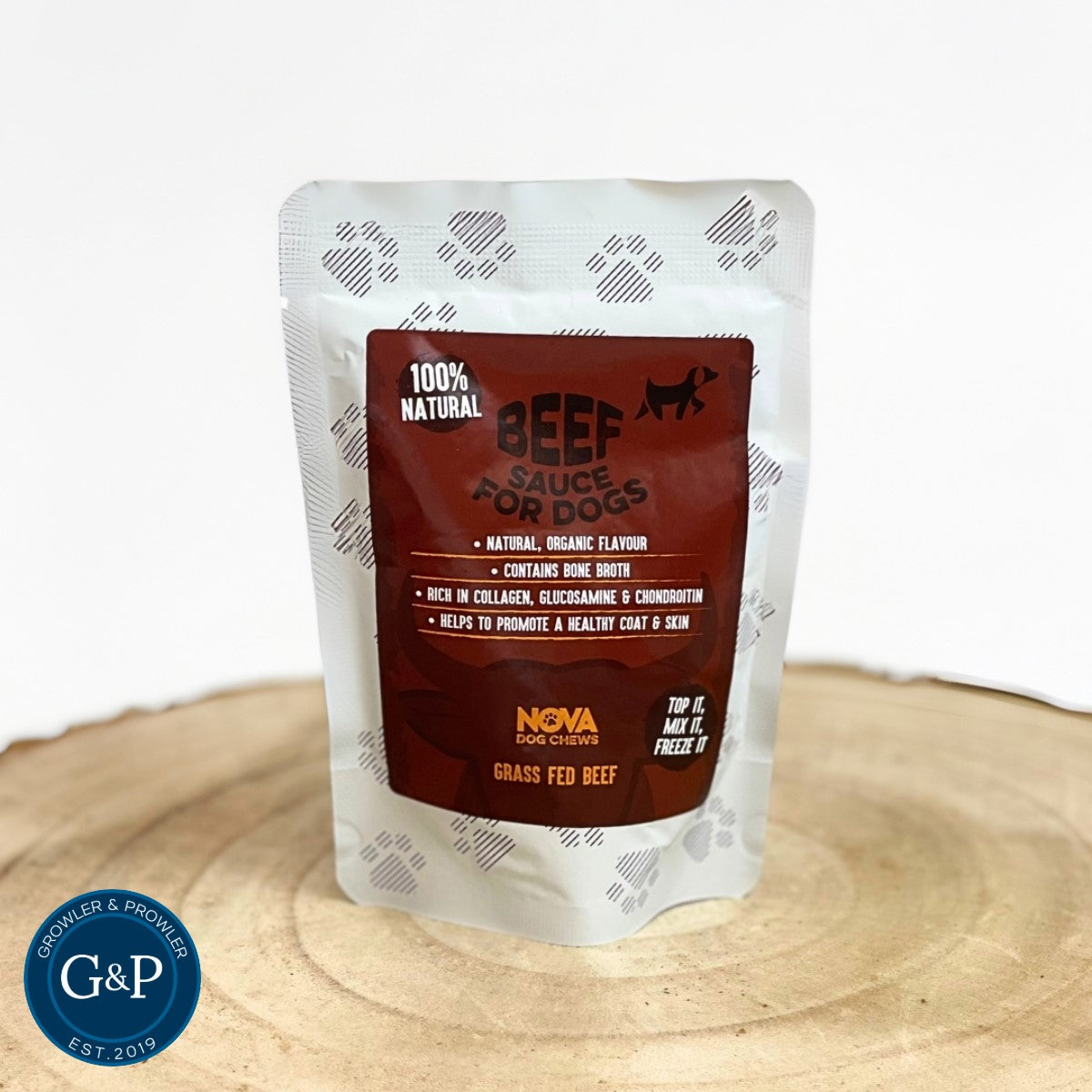 Nova Beef Sauce: A natural and organic dog treat made with grass-fed beef. Contains bone broth, collagen, glucosamine, and chondroitin for healthy skin and coat. Can be used as a topper, mixed with food, or frozen.