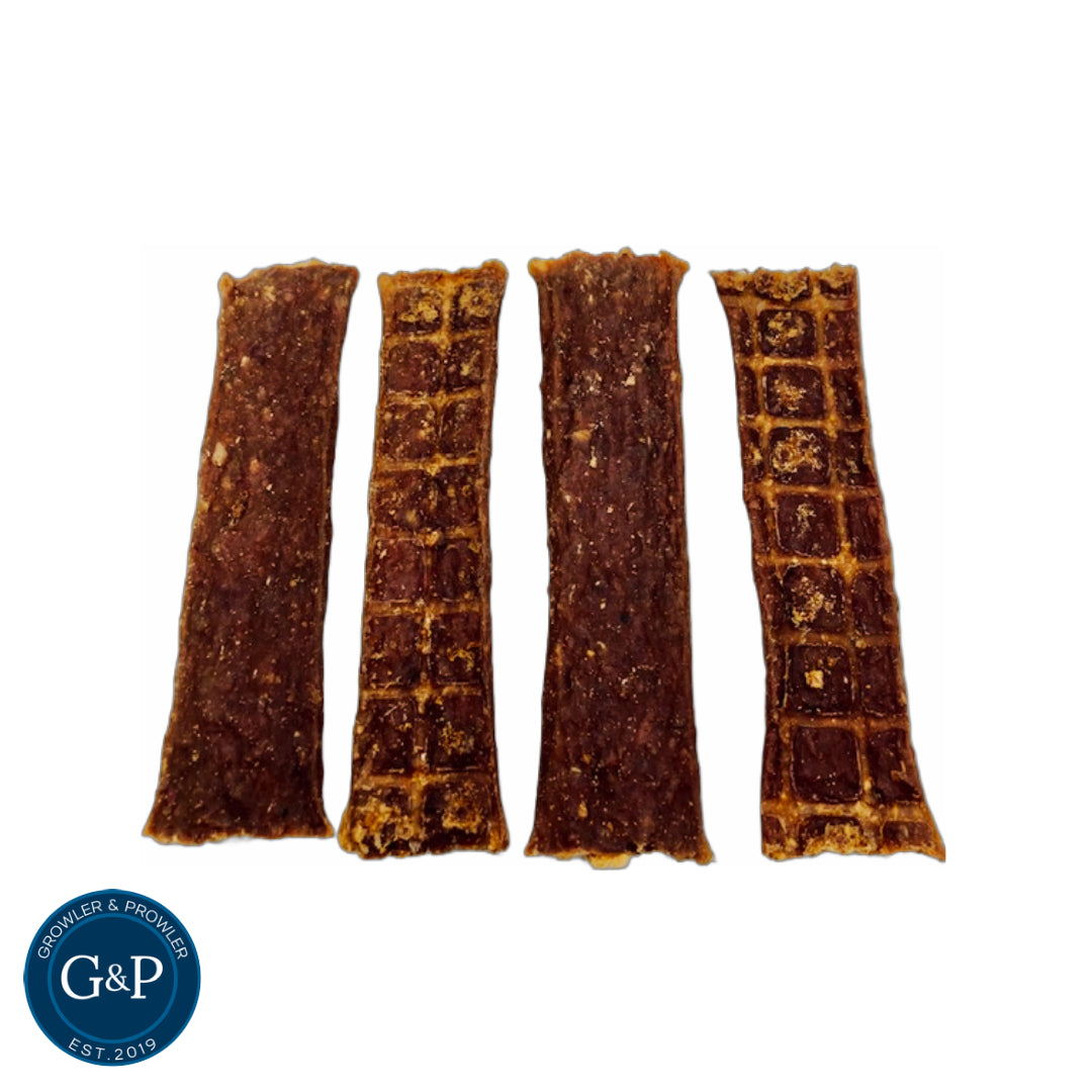 Rabbit Meaty Strip dog treat by Growler and Prowler. Made from 100% natural rabbit meat, these high-protein strips are grain and gluten-free, making them easy to digest. Perfect for dogs of all sizes and breeds, offering a guilt-free snack option.