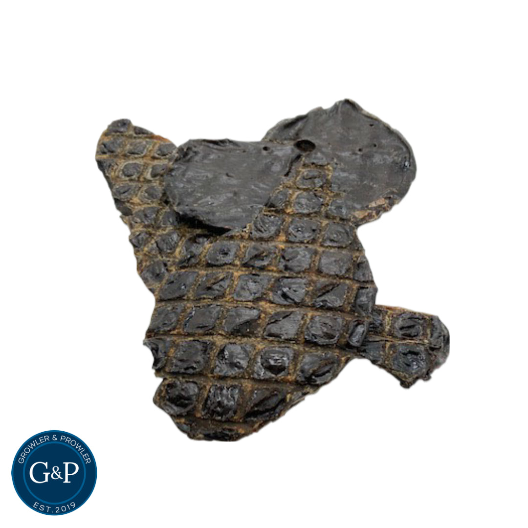 A dark, chewy beef liver jerky dog treat from Growler & Prowler, perfect for rewarding your furry friend.