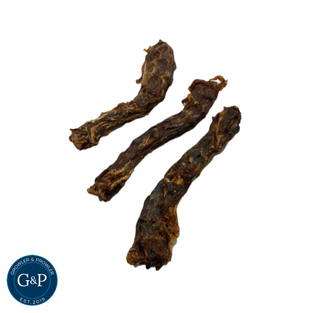 Three dehydrated duck necks from Growler & Prowler, a dog treat company based in Manchester.