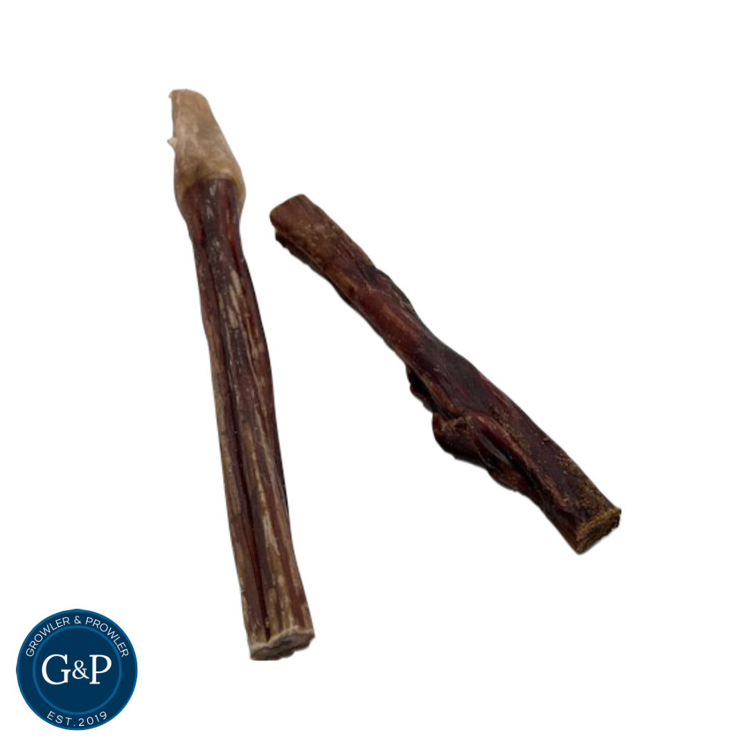 A pair of beef pizzle dog chews by Growler & Prowler. These all-natural treats are a healthy and long-lasting option for your furry friend.