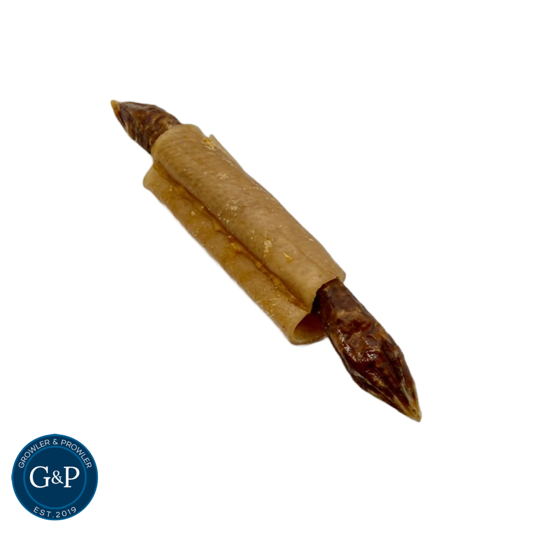 A single, rolled-up sausage treat wrapped in a thin, edible casing. The sausage is a dark brown colour and has a visible meat texture.