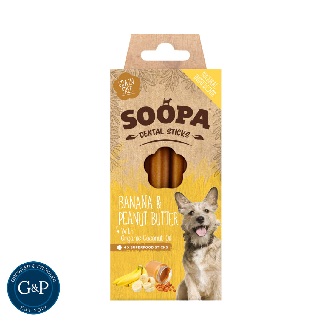 A bag of Soopa Banana & Peanut Butter Dental Sticks dog treats, featuring a happy puppy on the front. Made with natural ingredients and perfect for dental hygiene.