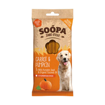 A package of Soopa Jumbo Carrot & Pumpkin Sticks for dogs. The sticks are made with natural ingredients, pumpkin seed, organic coconut oil, and are grain-free. The package shows a dog holding one of the sticks, with carrots and pumpkins in the background.