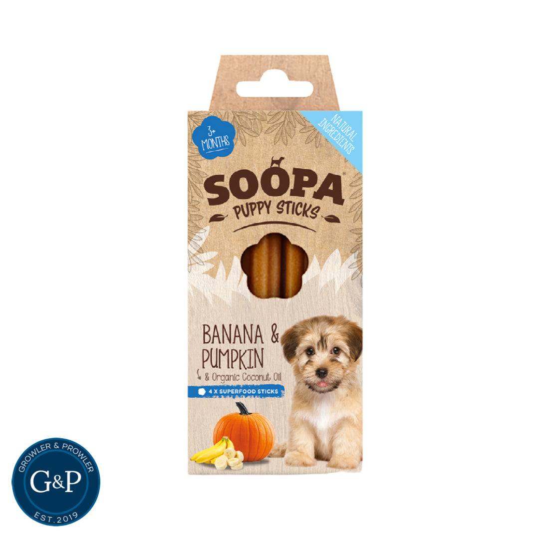 A bag of Soopa Puppy Sticks dog treats, featuring a happy puppy on the front. Made with natural banana, pumpkin, and organic coconut oil. A low-fat option for puppies over 3 months old.
