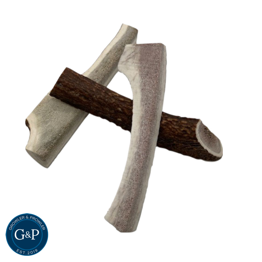 Natural dog chews made from split deer antlers, providing a long-lasting and satisfying chew experience.